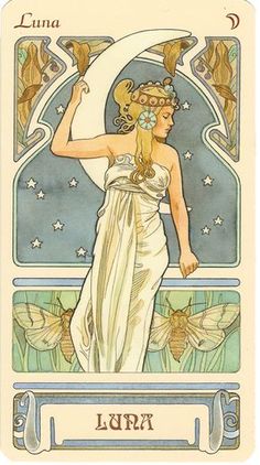 his image is an art nouveau style illustration likely for a tarot card. it depicts a woman in a flowing white gown standing within an ornate frame, her arm raised towards a crescent moon. two moths with pale green wings flank her, and behind her is a night sky filled with stars. the word "luna" is written in a banner at the top and bottom of the image, further solidifying the association with the moon. the overall aesthetic evokes a sense of mystery and ethereal beauty.