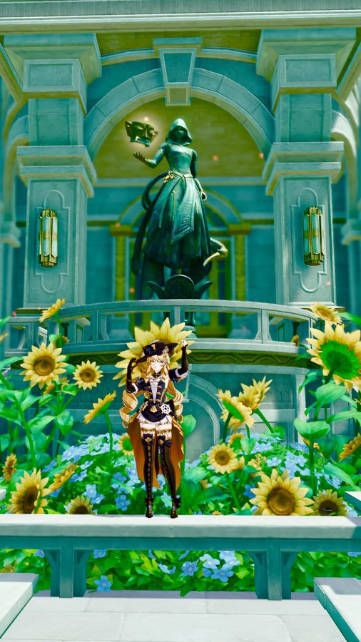 he image shows a screenshot from the video game genshin impact.  a female animestyle character in a pirateesque outfit stands in front of a tealcolored fountain. the fountain features a statue of a robed woman holding a glowing object.  the character is surrounded by sunflowers and blue flowers.  the background is a grand teal building with classical architecture.  the overall aesthetic is whimsical and fantastical.
