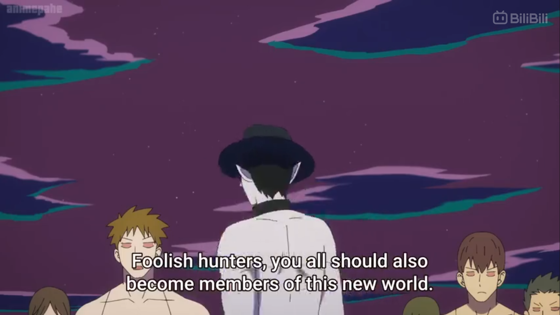this appears to be a still from an anime. a group of people are facing away from the camera, towards a man with pale skin, dark hair, and wearing a hat, who appears to be speaking to them. the background is a dark purple and blue, evocative of night. the text "foolish hunters, you all should also become members of this new world" is superimposed over the image.