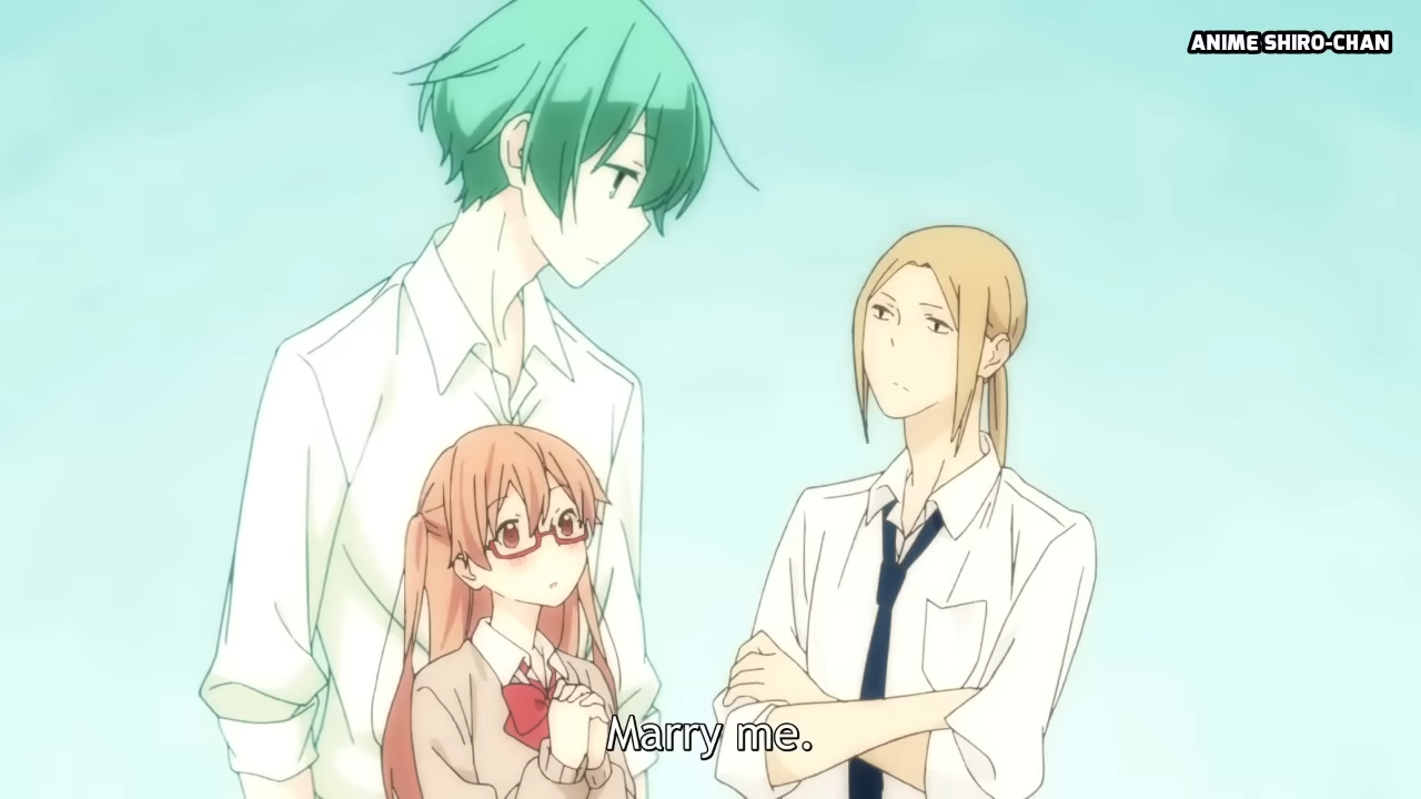 a screenshot from an anime, likely a romance. it shows a short, young girl with orange hair and glasses proposing to a tall boy with green hair. they are both wearing a japanese school uniform. another boy with blond hair stands next to them, watching the interaction with his arms crossed. the background is a solid pale teal color.