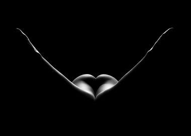 the image is a striking black and white photograph of a female form.  the subject is positioned such that their back and buttocks are prominently featured, creating a heartlike shape at the center. the lighting is dramatic, using strong backlighting or side lighting to create a stark silhouette against a completely black background.  only the outline and subtle shading of the body are visible, emphasizing the curves and shape.  the overall aesthetic is minimalist, sensual, and artistically suggestive.