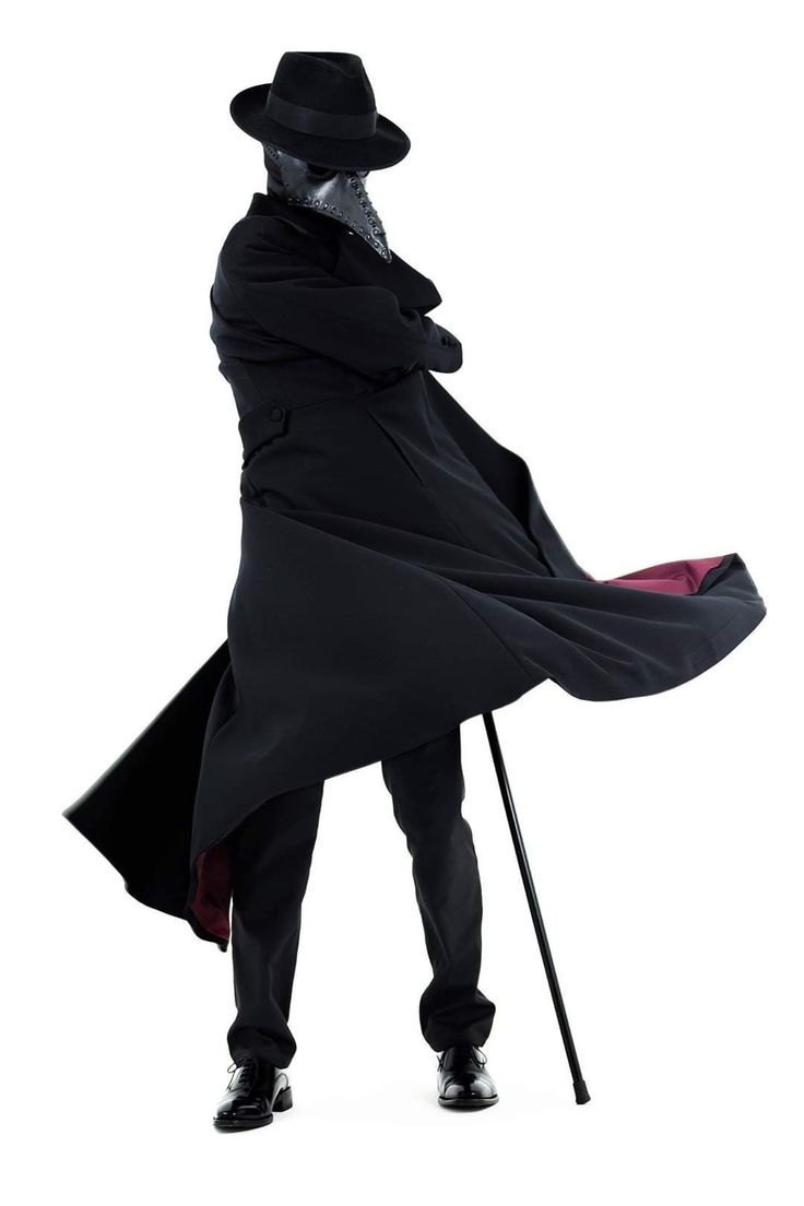 a man wearing a black coat, hat, and mask, standing on a white background. he is holding a long stick in his right hand and wearing black shoes. he is posed as if he is about to walk away.  he is dressed in a formal and elegant style.  he is mysterious and has a strong presence.