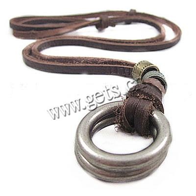 this is a closeup image of a men's leather necklace. the necklace is made of brown leather cord with a silver ring pendant and metal accents. the ring pendant is double layered and appears to be made of a sturdy metal. the necklace has a casual and simple design, making it a perfect everyday accessory.