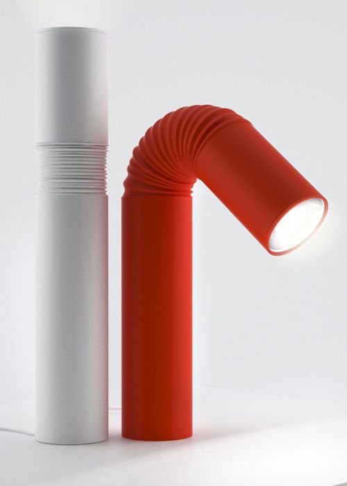 the image shows two table lamps standing sidebyside on a white surface. the lamp on the right is red with a flexible, ribbed neck that can be bent into different positions.  the lamp on the left is white and cylindrical with a simpler design, appearing more like a base or stand. both lamps are minimalist and modern in style. the lighting from the red lamp is clearly visible.