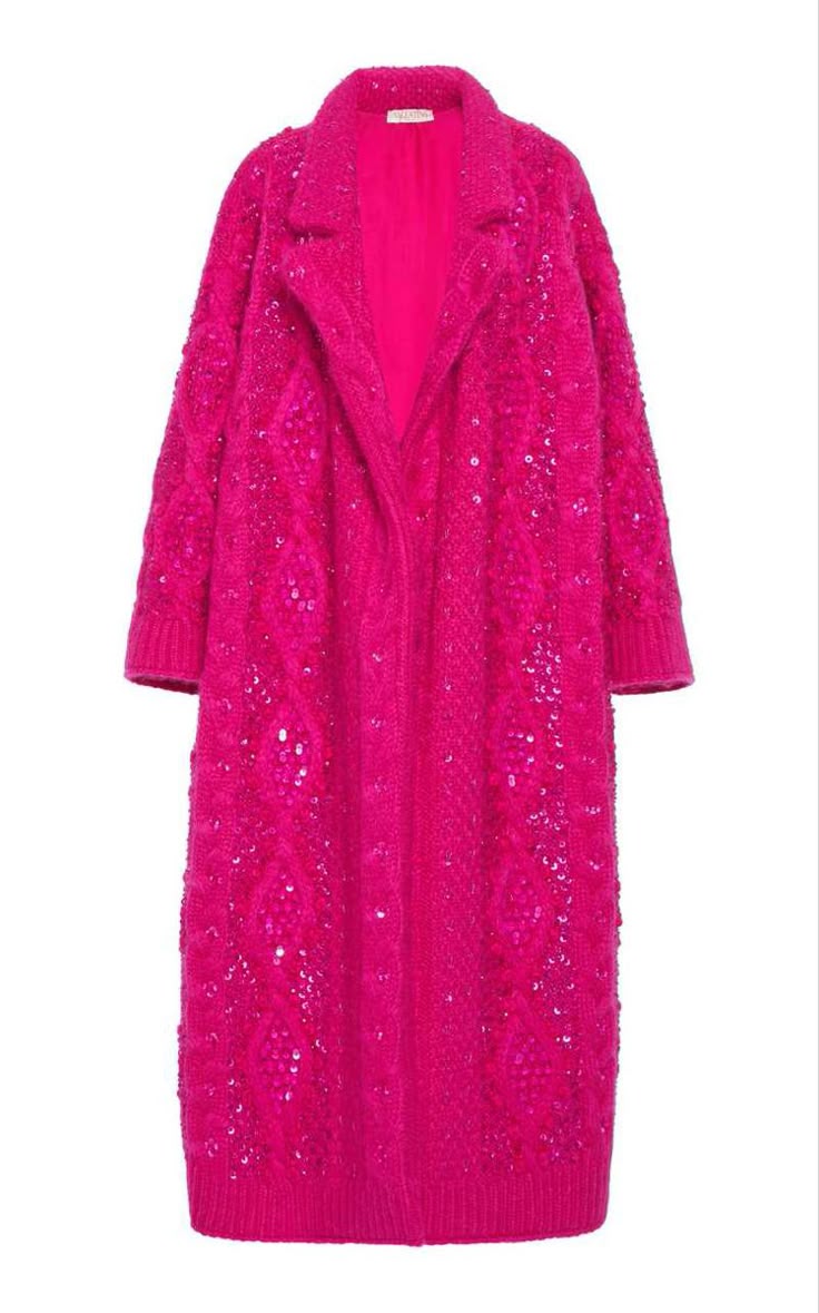 a magenta knit cardigan coat is depicted in a full shot against a white background. the coat is kneelength, has long sleeves, and features a collar. the knit pattern is visible throughout the coat.