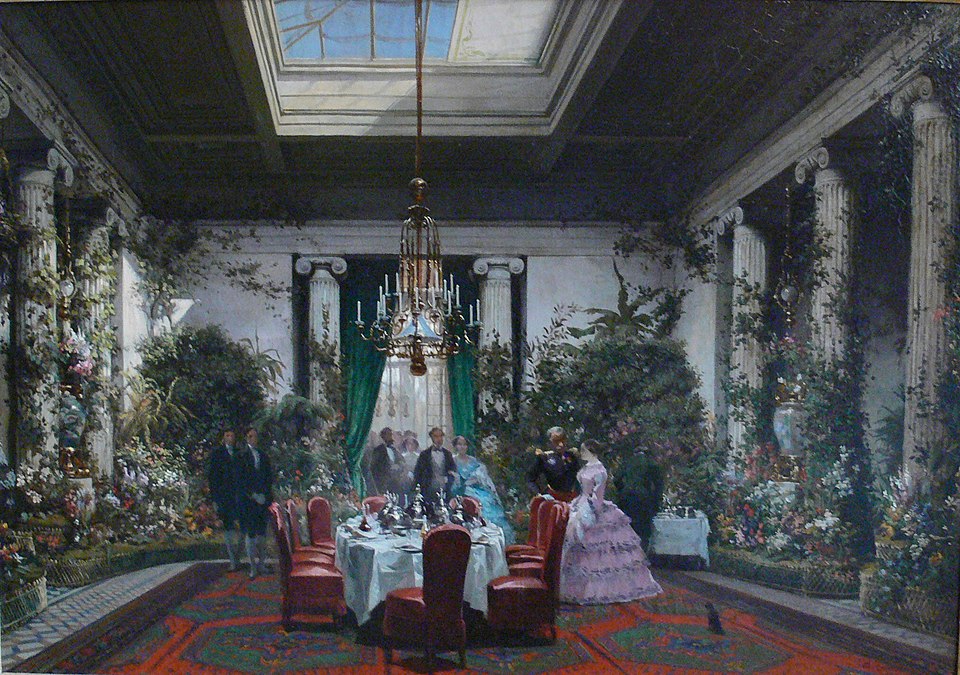 the painting depicts a grand, formal dining room decorated with an abundance of floral arrangements and greenery. several people in formal attire are present, some standing near a dining table set for a meal. the room is illuminated by a chandelier and natural light filtering through a skylight. architectural elements like columns add to the room's grandeur. a patterned carpet covers the floor, and plants are arranged throughout the space.