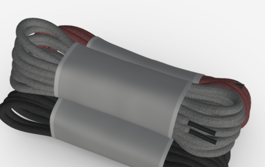 the image shows two rolls of shoelaces bundled together.  the laces appear to be made of a waxed or similar type of fabric, giving them a ropelike texture. the rolls are wrapped in gray packaging.  there are three colors visible: dark grey, black and a dark maroon.  the packaging suggests a retail or commercial setting, implying they are for sale.