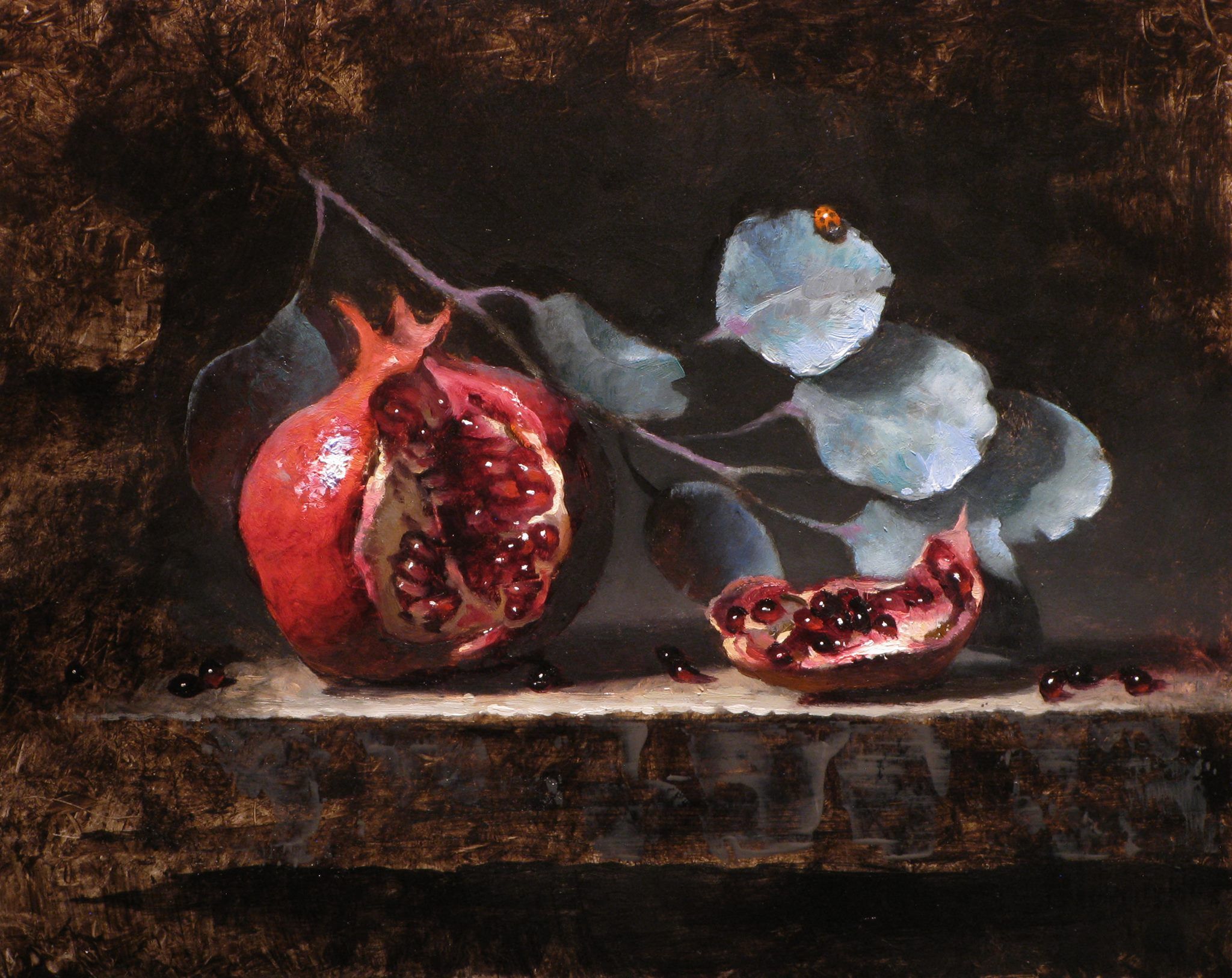 this oil painting depicts a still life of a pomegranate with its seeds exposed, lying on a dark wooden surface, with a few leaves from a eucalyptus branch resting on the surface behind it. the painting is done in a dark and moody palette with muted colors. the pomegranate is the focal point of the painting. it is contrasted with the dark background and the dark leaves, which make the fruit appear even more vibrant. the overall feeling of the painting is one of calmness and tranquility.  the painting is artistic and beautiful.