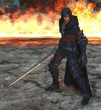 a video game character stands in armor with a sword in front of a fire.