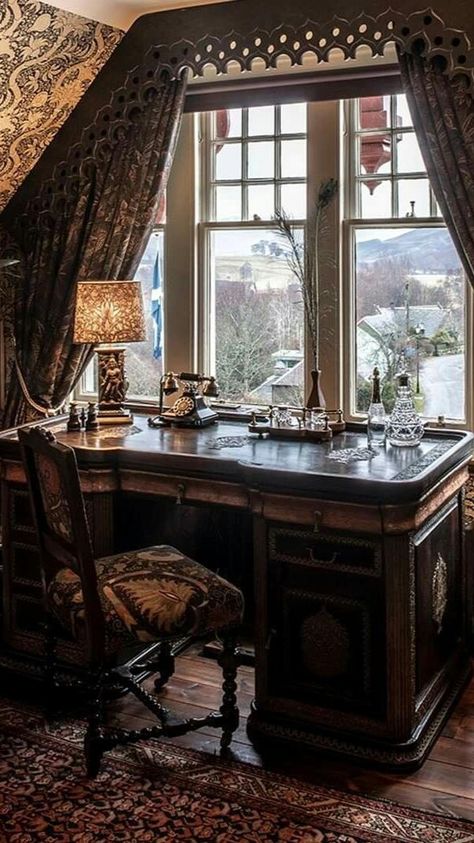 the image showcases a vintagestyle office space bathed in warm, natural light streaming through a large window. the focal point is a grand, dark wood desk adorned with ornate carvings. an antique chair with a tapestry seat complements the desk, creating an air of timeless elegance. a vintage lamp with a patterned shade casts a soft glow on the writing surface, while heavy, draped curtains frame the window, adding a touch of drama and sophistication. the view outside the window hints at a serene landscape. the overall ambiance is one of refined luxury and classic charm.