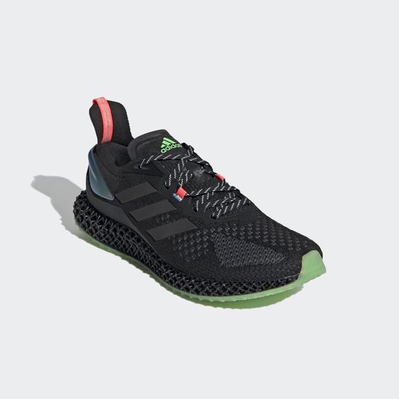 a black adidas running shoe with a green sole is shown against a white background. the shoe has a neon green accent on the heel and laces. the laces are black and tied in a bow. the shoe has a black adidas logo on the side and tongue. the sole has a textured pattern.