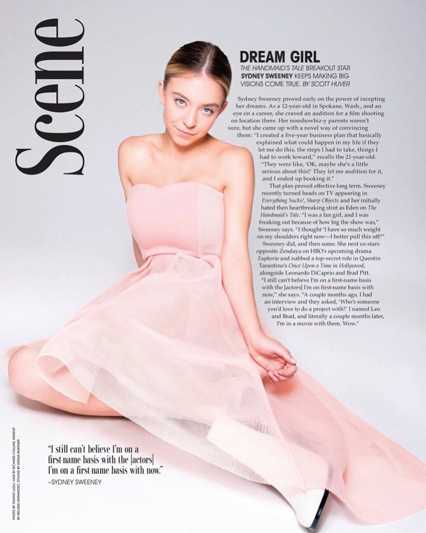 the image is a magazine spread featuring sydney sweeney, a young actress known for her roles in shows like the handmaid's tale and euphoria. she is photographed in a flowing, light pink dress, sitting on the floor. the accompanying text is an interview where she discusses her career trajectory, her ambitious planning from a young age, and her current success, noting working with highprofile actors on a firstname basis. the overall aesthetic is clean, bright, and emphasizes sweeney's youthful yet accomplished image. the "scene" title suggests it's a fashion or entertainment magazine.