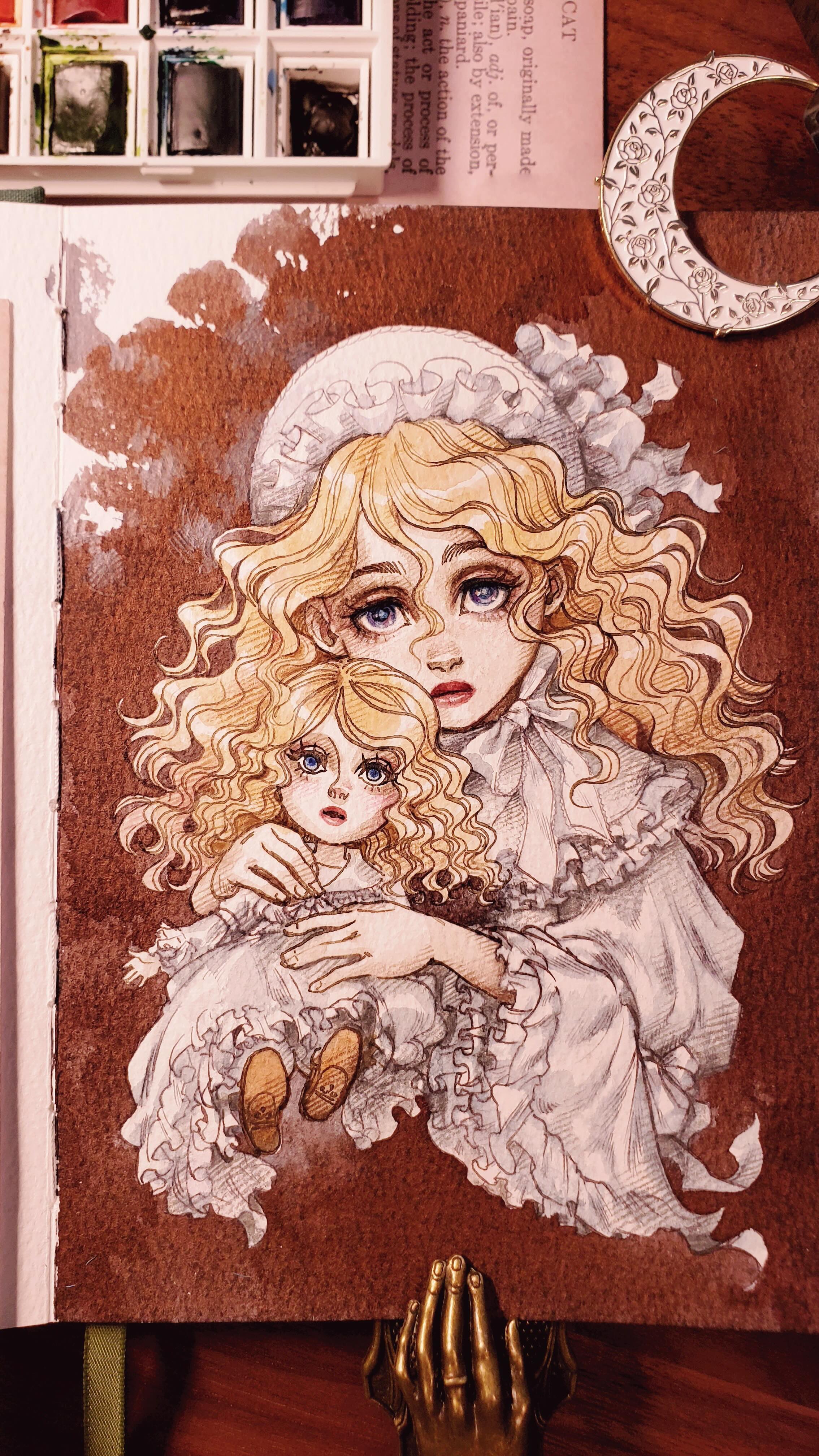 the image shows a detailed watercolor painting of a young girl with long, blonde, curly hair. she is dressed in a victorianstyle dress with lace detailing and is holding a smaller doll, similarly dressed. the painting is done in sepia tones on a brown background.  watercolor paints and a palette are visible in the upper left corner, along with a decorative moonshaped ornament and a bronze hand sculpture in the lower right and left corner, suggesting the artwork is in progress or recently completed.  the overall style is delicate and evocative of a sentimental, nostalgic mood.