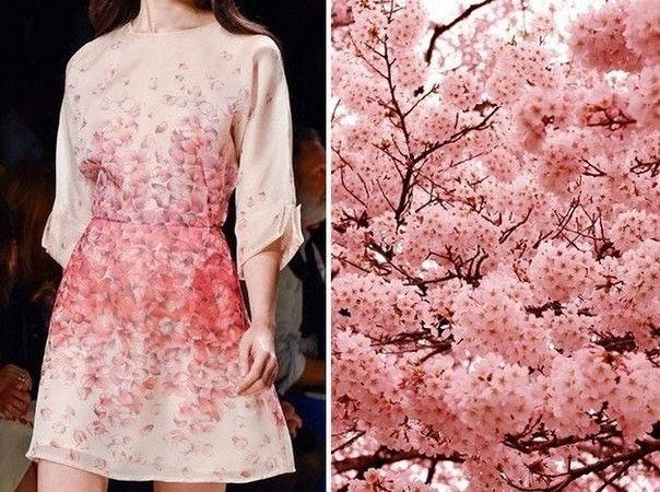 a woman in a pink and white floral dress stands in front of a beautiful cherry blossom tree in full bloom. the dress is made of a delicate fabric and the pattern is reminiscent of the cherry blossom flowers. the model looks elegant and feminine and her beauty is accentuated by the soft, romantic atmosphere of the scene.