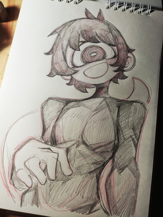 a handdrawn pencil sketch of a character with large black eyes, black hair, and a simple white shirt. the character is depicted from the chest up, with one hand reaching out in front of them. the sketch has a cute, cartoonish style and is done on white paper with a light gray background. the character looks to be in a happy and carefree state.