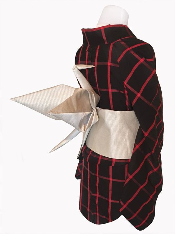 a kimono with a plaid pattern, a wide obi, and origami paper crane detail.
