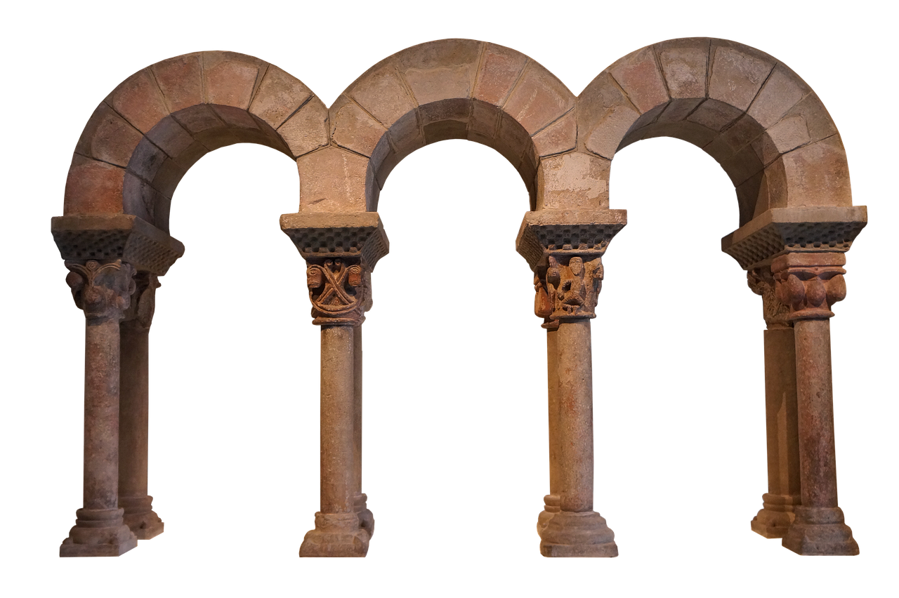 the image shows a set of three romanesque arches supported by columns. the arches are made of light reddishbrown stone and have a semicircular shape. the columns have decorative capitals with various carved details, including figures and geometric patterns. the background is black, which isolates the architectural element.