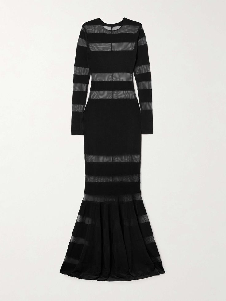 a black longsleeved maxi dress with a fitted bodice and a flowing skirt. the dress is made of a sheer mesh fabric that is striped with opaque black bands. the dress is elegant and glamorous, perfect for a formal event or a night out.