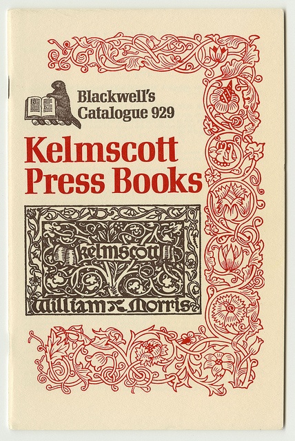 a cover of a book from the kelmscott press. the cover is decorated with ornate red and black floral designs and lettering. the title, "kelmscott press books" is displayed prominently in red with the publisher's name, "william morris" beneath.  a small illustrated image of a book and a beaver, along with the text "blackwell's catalogue 929"  is found in the top left corner of the cover.  the cover is made of an offwhite paper stock.
