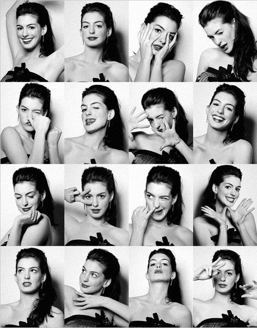 a black and white photo booth style image of anne hathaway making various funny expressions. she's wearing her hair up in a simple updo and has minimal makeup. the photo collage includes 16 portraits of hathaway. she makes funny faces like sticking out her tongue, covering her eyes, and looking confused, and she also strikes some more serious poses. the background is a simple white.