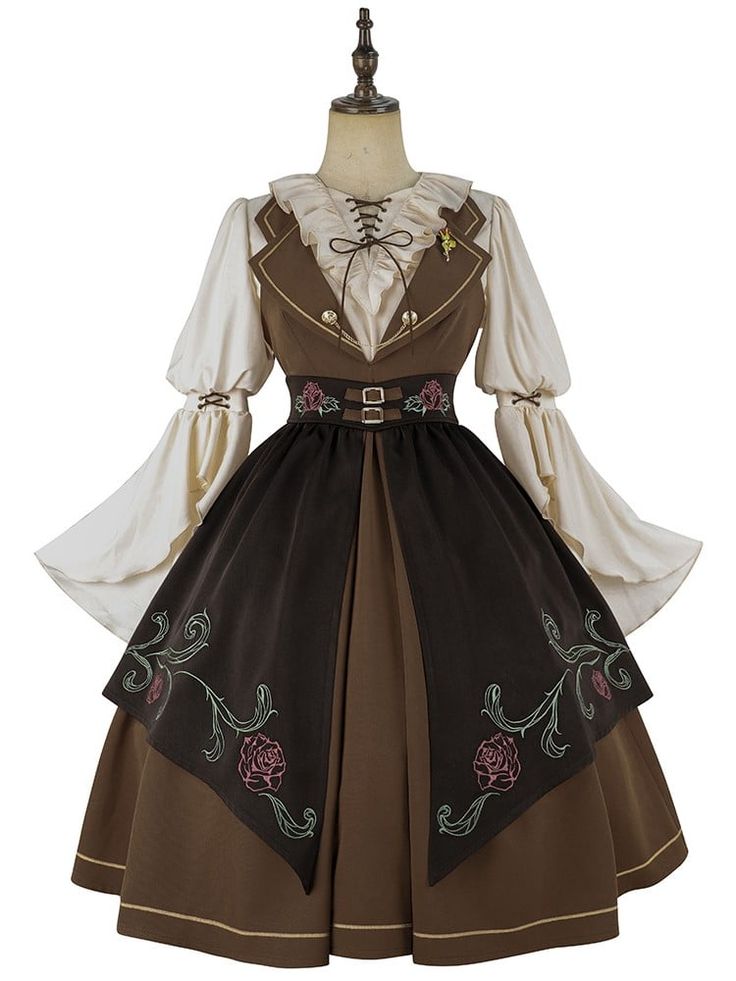 a brown lolita fashion dress with intricate embroidery and a vintage aesthetic is shown against a plain white background. the dress features a white blouse with puffed sleeves and a brown bodice with floral embroidery. a brown belt with a gold buckle cinches the waist.  the dress is displayed on a mannequin.