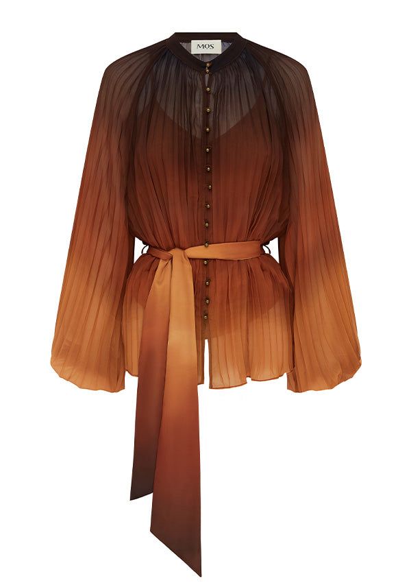 a women's blouse with a gradient ombre effect, transitioning from dark brown at the top to a lighter brown at the bottom. it features long, pleated sleeves and a buttondown front. a matching belt is tied around the waist.