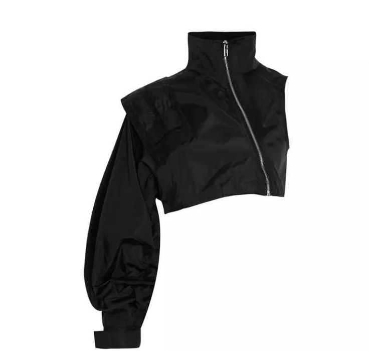 a cropped black jacket with an asymmetrical design, featuring one long, puffy sleeve and a high, zippered neckline. the garment is isolated on a white background, emphasizing its unique silhouette.