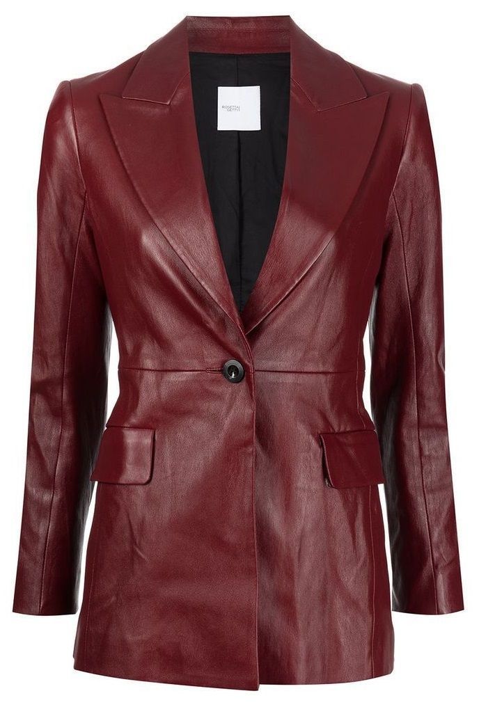 a frontfacing studio shot of a red leather blazer. the blazer has a structured collar, singlebutton closure, and front flap pockets. the interior is visible and is black. a small white label is visible inside.