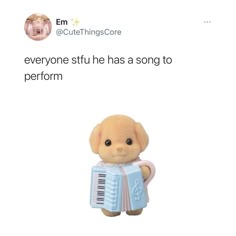 a small dog toy holding a light blue accordion. the dog is white and brown with light peach ears. the accordion has a light blue body with white keys and a light blue music note on the front.  the toy is on a white background.  there is a tweet above the toy that says, "everyone stfu he has a song to perform."