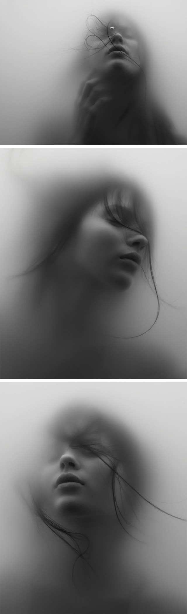 the image is a triptych of black and white underwater photographs. each panel shows the face of a young woman partially submerged in water, giving a hazy, blurry, ethereal effect.  her features are soft and indistinct, and her hair appears to flow around her.  the overall mood is mysterious and dreamlike, creating a sense of serenity and tranquility, but also suggesting an element of the enigmatic.  the lack of sharp focus contributes to the dreamlike atmosphere and emphasizes the abstract quality of the images.