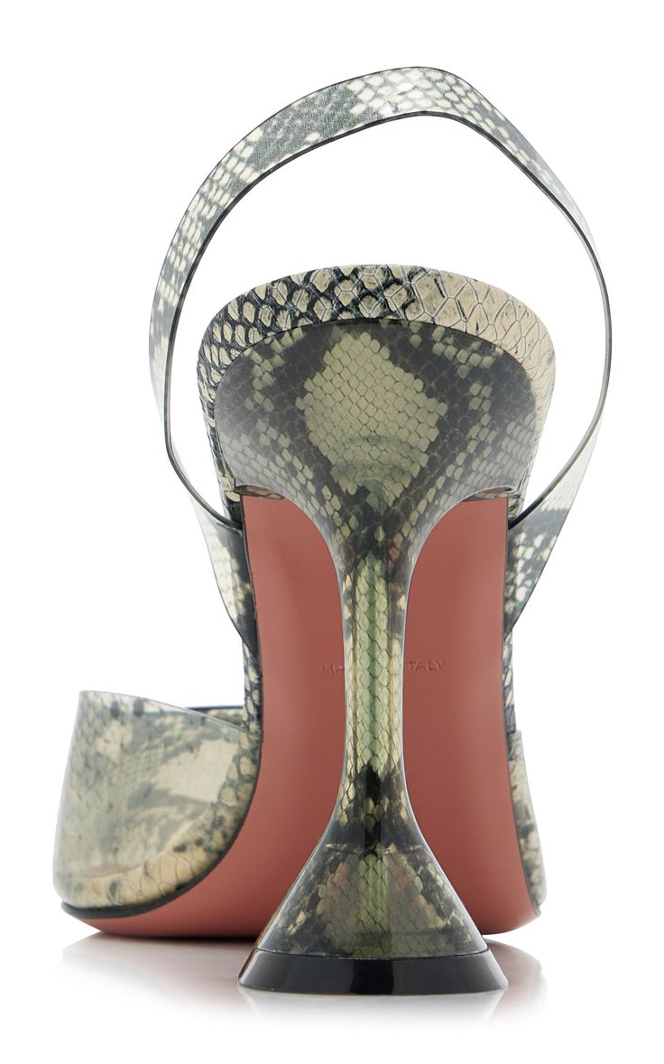 a rear view of a pair of women's highheeled slingback shoes. the shoes are made of a snakeskinpatterned material in shades of beige, green, and grey. the heels are unique, featuring a flared, almost sculptural, design.  the shoes are elegant and appear to be highend or designer footwear. the background is a clean white, allowing the shoes to be the focal point of the image.