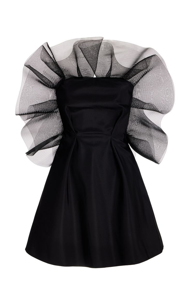 a black dress with a tulle ruffle top. the dress is fitted through the bodice and has a slightly flared skirt. the dress is perfect for a formal occasion or a night out.  it is stylish and elegant, and the tulle ruffle adds a touch of whimsy. the dress is available in sizes sxl.