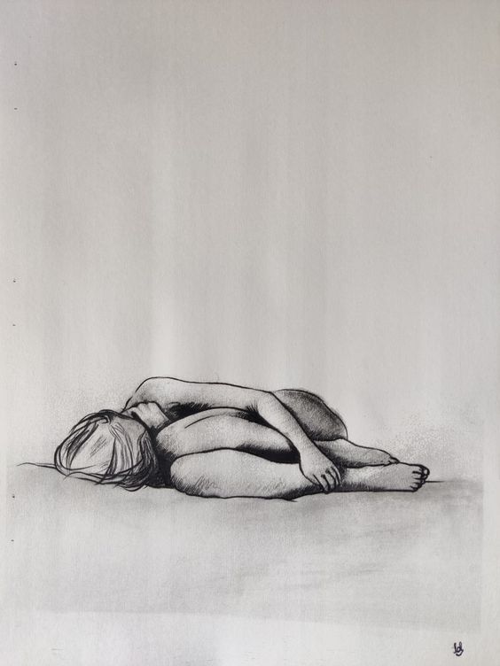 a black and white charcoal sketch of a woman lying on her side, curled in a fetal position.  the woman's face is obscured by her hair. the drawing is very realistic. the woman's body appears to be slightly hunched over, which could be interpreted as a sign of sadness or depression.  the drawing is simple yet powerful, capturing a moment of vulnerability and emotion.