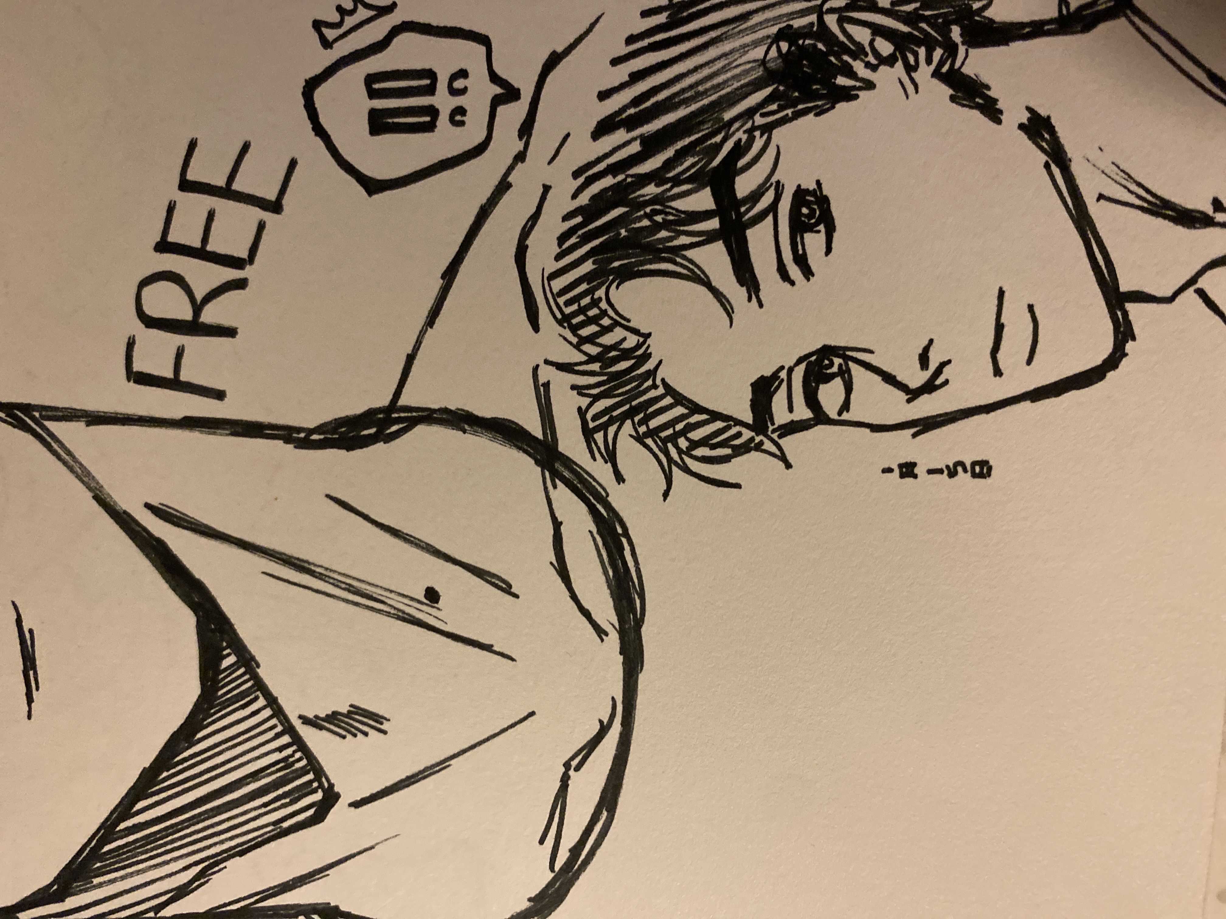 the image is a handdrawn sketch, likely done with ink, in a style reminiscent of manga or anime.  it features two distinct parts. the upper portion shows a closeup of what appears to be the back of someone's head and neck, possibly wearing a hood or some kind of covering. the lower part prominently displays a detailed portrait of a young man's face and upper torso.  he has dark hair, a somewhat serious expression, and is drawn in a realistic yet stylized manner.  the word "free" is written above him, accompanied by a small speech bubble with seemingly indecipherable symbols inside. a small, almost illegible signature or notation is visible to the left of the man's face. the overall style suggests a personal piece of art rather than a professional, published work.