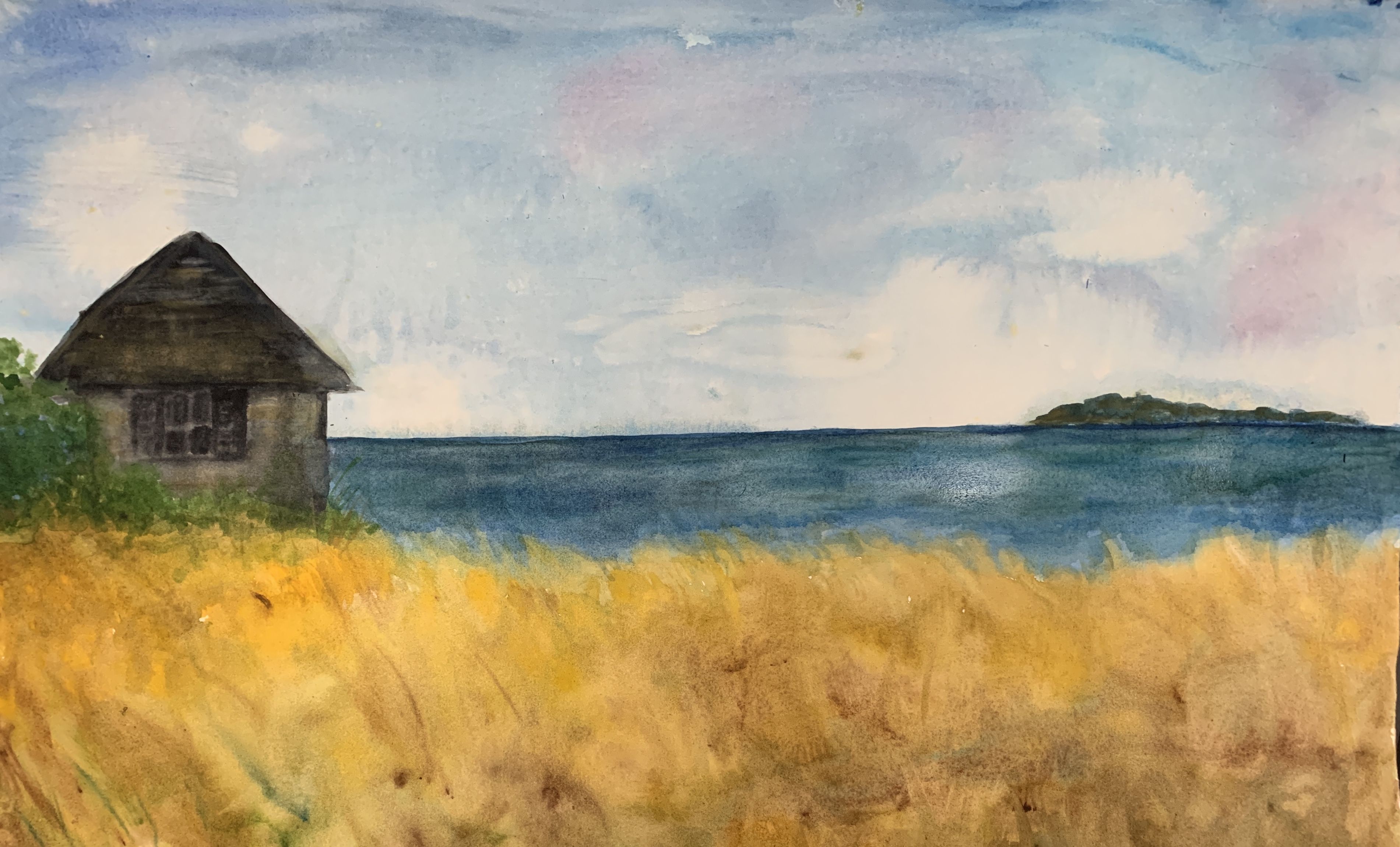 this watercolor painting depicts a serene coastal landscape. a small, solitary building with a thatched roof stands on the edge of a field of golden yellow grass, overlooking a tranquil blue sea. a small island can be seen in the distance, beneath a partially cloudy sky. the overall impression is one of peace and tranquility, evoking a sense of quiet solitude.