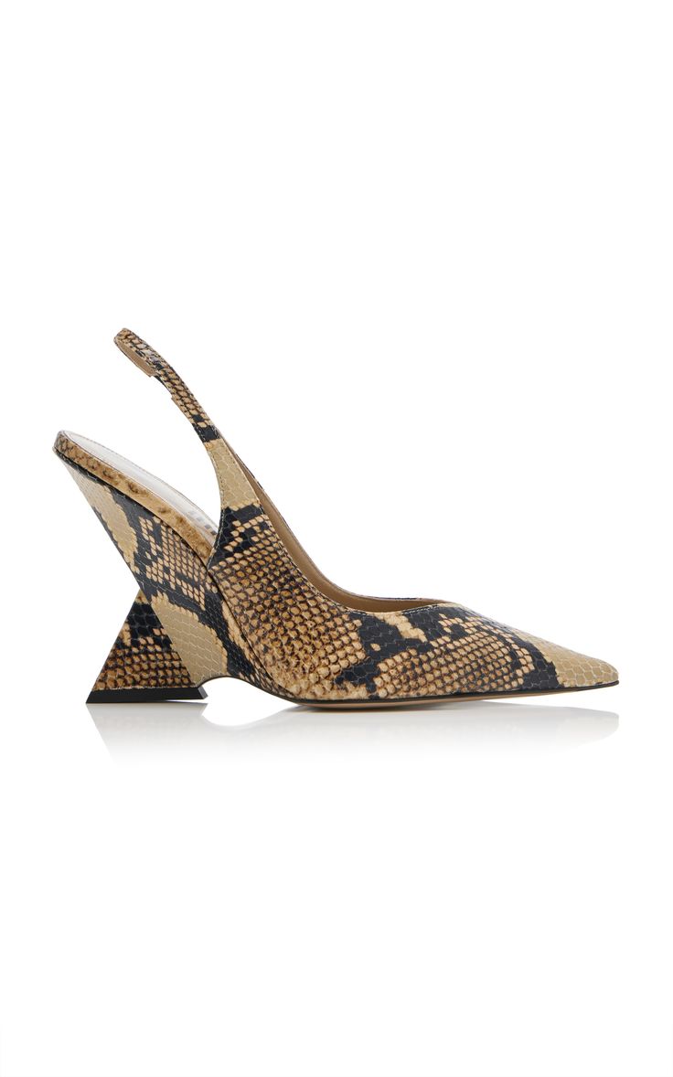 pair of women's beige and black snakeskin print slingback wedge heels are shown in the image. the shoes have a pointed toe and a unique wedge heel design.  the shoes are positioned on a white background, with a slight reflection visible below. the image is clean, welllit, and showcases the shoes in detail.