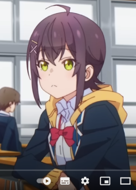 an anime girl with brown hair and yellow eyes sits at a desk in a classroom, looking slightly annoyed. she is wearing a blue and white uniform with a yellow hoodie.