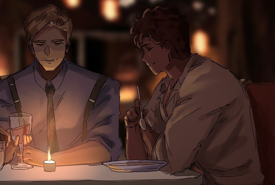 two men are on a date, sitting across from each other in a restaurant. there is a candle lit in the center of the table. both men have smiles on their faces, and they are seemingly enjoying each other's company.  the man on the left is holding a glass of wine, while the man on the right holds a spoon.  both men seem to be deeply in love and enjoying their date.