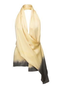 a yellow silk halter top with a brown ombre effect at the bottom.  the top is made of a soft, flowing material that drapes beautifully.  the top can be tied in the back or front, creating a versatile look.  the ombre effect adds a touch of sophistication to the design.  the top is perfect for a variety of occasions, from casual to formal.