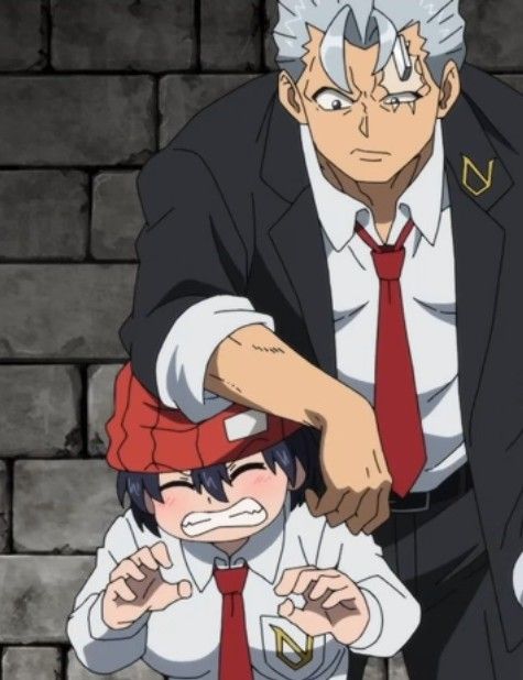 a tall, muscular man with slickedback gray hair and a scar over his eye glares down at a small, frightened boy. the man is dressed in a dark suit with a red tie, while the boy wears a white shirt, red tie, and red beanie. the man's hand rests heavily on the boy's head, and the boy's expression is one of terror. the background is a plain gray brick wall.