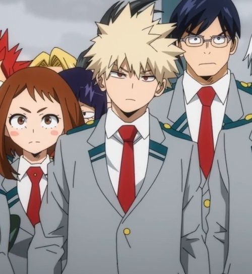 the image features a group of anime characters in school uniforms. the main character is a male with spiky blonde hair and red eyes. he's wearing a white shirt and gray blazer with a red tie. next to him is a female with long brown hair and a red tie. she is wearing the same uniform as the boy. there are other characters behind them, including another male with black hair and a gray blazer and red tie. the characters are all smiling and appear to be happy.  the overall theme is that of a group of friends or classmates in a school setting.