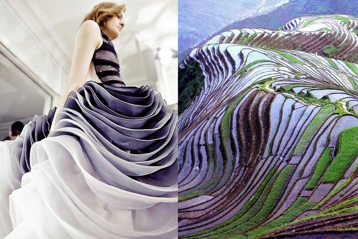 the image is a sidebyside comparison of two disparate scenes: a woman wearing a multilayered gown on the left and an aerial view of rice terraces on the right. the gown has cascading layers of fabric that transition in color from white at the base to dark blue at the top. the rice terraces are stepped fields with water reflecting the sky, creating a striped pattern of blue, brown, and green. the comparison highlights the visual similarities between the patterns and textures of the two subjects.