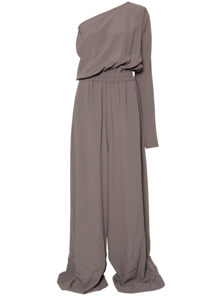 a oneshoulder gray jumpsuit featuring long sleeves and wide legs. the jumpsuit has a relaxed, casual fit and is made from a soft, flowy fabric. it is a great choice for both casual and dressy occasions.