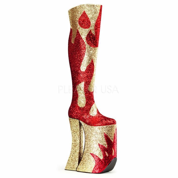 a single, kneehigh platform boot with a very high heel. the boot is red with glitter and has a gold flame pattern that starts at the base and ends near the top. the heel and platform are gold with glitter, and red flames are visible near the base.