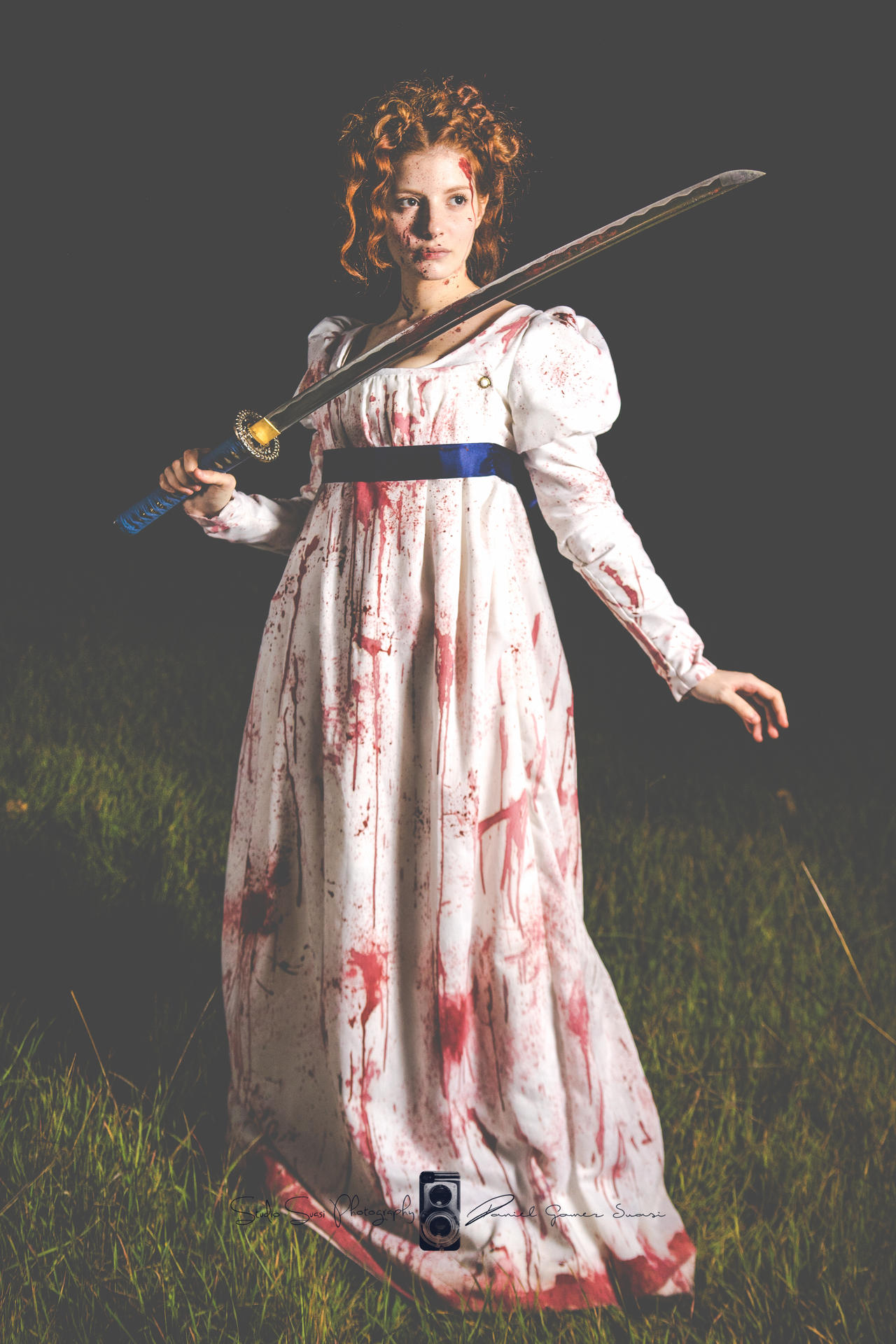 a dramatic portrait of a woman in a bloodsplattered white regencyera dress, holding a katana across her shoulders. the setting is outdoors at night, with tall grass in the foreground and a dark background. the image is styled to look artistic and evocative, with a slightly desaturated color palette. the overall mood is dark, violent and mysterious.  the woman's expression is intense and her posture suggests aggression.