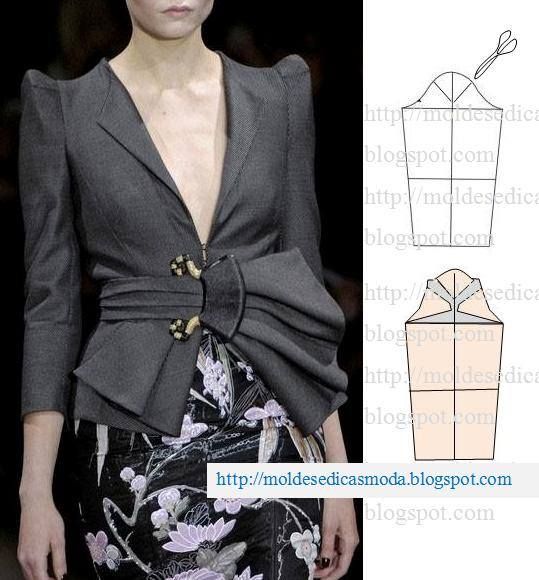 the image shows a woman wearing a stylish grey blazer paired with a floral skirt. to the right of the blazer is a sewing pattern diagram, likely related to the blazer's design. the bottom of the image has the website address "http://moldesedicasmoda.blogspot.com" and other blogspot urls listed, suggesting the image is sourced from a fashion or sewingrelated blog.