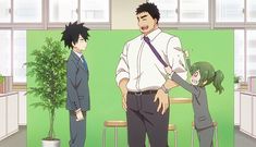 the image shows three anime characters in a classroom setting. there is a tall man with short black hair and a white shirt, likely a teacher, standing in the center. to his left is a taller, slim man with black hair and a black suit, potentially another teacher or a student. on the teacher's right is a young girl with green hair tied in pigtails, wearing a brown dress, likely a student. they seem to be interacting, with the girl reaching out towards the teacher. the background features a green chalkboard, potted plants, and the top of a desk, indicating a typical classroom environment. the color palette is predominantly light and bright, creating a cheerful atmosphere.