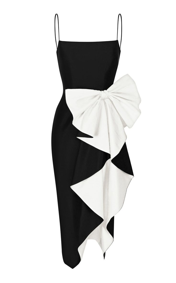 a black dress with spaghetti straps and a large white bow on the side.