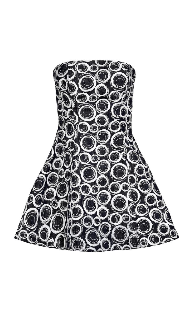 this is a strapless dress with a black and white circle pattern.