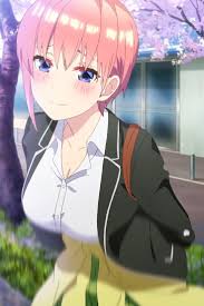the image shows a closeup of ichika nakano, an anime girl with pink hair and blue eyes, wearing a school uniform consisting of a white collared shirt and a black blazer.